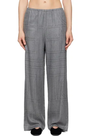 Totême Pantalon de détente de style pyjama gris en flanelle à monogrammes