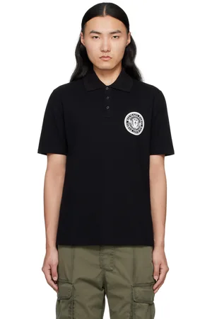 Balmain Polo noir en coton à logo circulaire