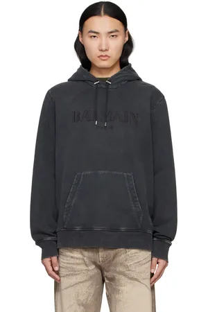 Balmain Pull à capuche gris à logo rétro brodé