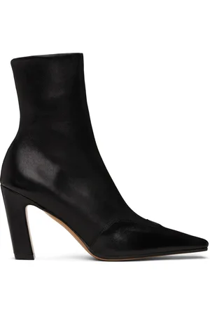 Khaite Bottes à talon bottier Nevada noires en cuir extensible