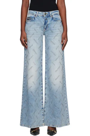 VERSACE Jean évasé bleu à logos à ornements facettés