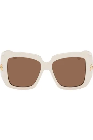 Gucci Lunettes de soleil blanc cassé à ferrures à logo GG