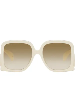 Gucci Lunettes de soleil carrées surdimensionnées blanc cassé à logos découpés