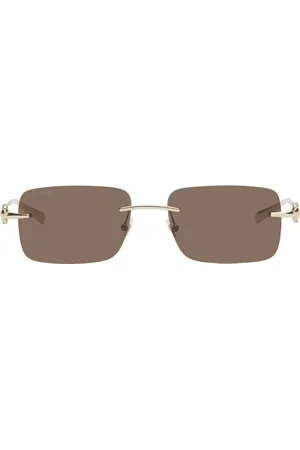 Gucci Lunettes de soleil rectangulaires dorées