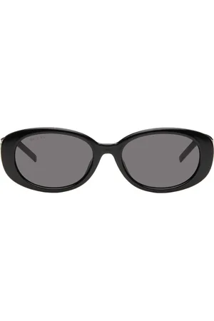 Gucci Lunettes de soleil noires à ferrures à logo G String