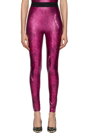 VERSACE Legging rose à motif peau-de-serpent et logos imprimés