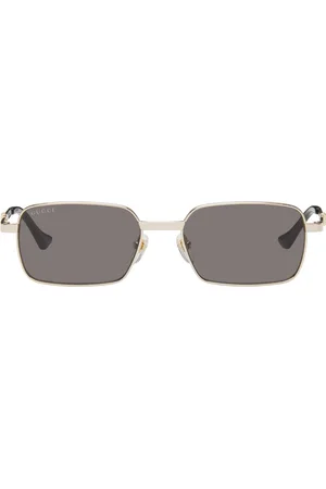 Gucci Lunettes de soleil rectangulaires dorées