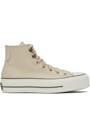 Converse Baskets hydrofuges Chuck Taylor All Star beiges en cuir à plateforme