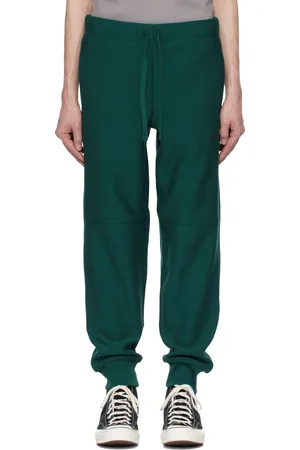 Carhartt Pantalon de survêtement vert à logo American Script