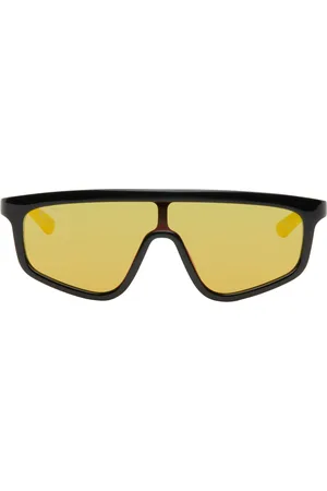 Gucci Lunettes de soleil de type visière noir et jaune