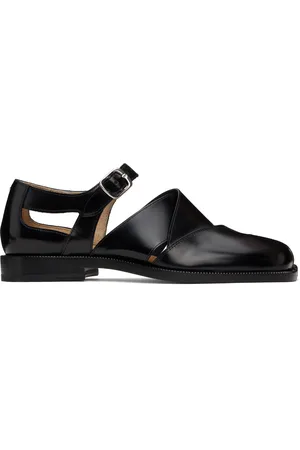 Maison Margiela Flâneurs noirs en cuir à bout Tabi