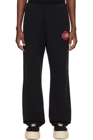 Maison Margiela Pantalon de survêtement noir à logo modifié exclusif à SSENSE