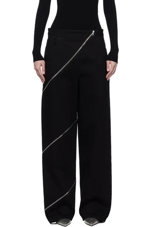 Alaïa Jean noir à assemblage en spirale
