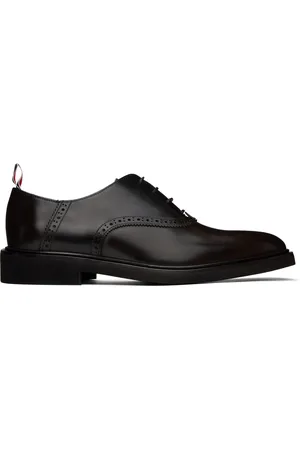 Thom Browne Chaussures oxford noir et brun à plastron