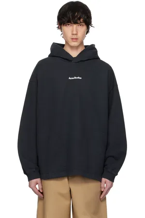 Acne Studios Pull à capuche noir à estampe du logo