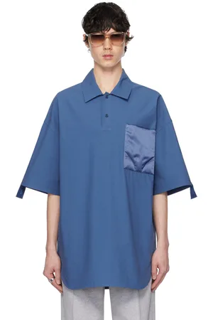 J.W.Anderson Polo bleu à poche matelassée