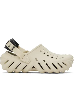 Crocs Sabots beige et noir à semelle Echo