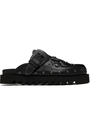 TOGA PULLA Flâneurs de style sabot à enfiler noirs à ornements en métal exclusifs à SSENSE