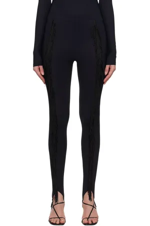 Maison Margiela Legging noir à franges et à sous-pieds