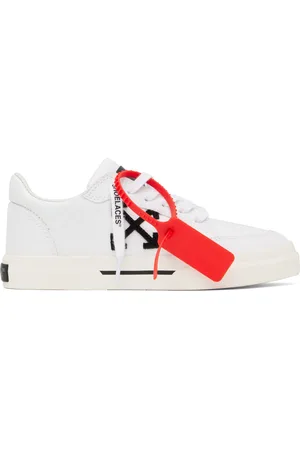 OFF-WHITE Baskets basses blanches en canevas à semelle en caoutchouc vulcanisé