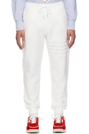 Thom Browne Pantalon de détente blanc à quatre rayures et à garniture tricolore