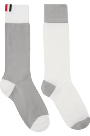 Thom Browne Chaussettes hauteur mollet blanc et gris à quatre rayures et à panneaux