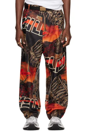 LU’U DAN Pantalon Junkyard noir et orange