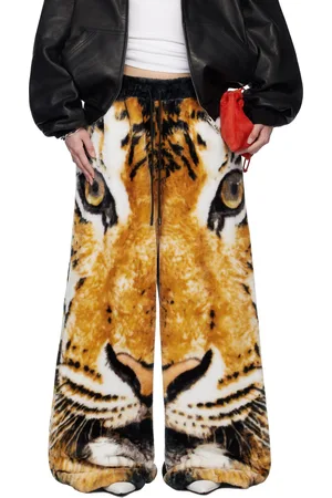 LU’U DAN Pantalon de détente de style bontan orange et noir à bords bruts