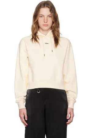 Jacquemus Pull à capuche beige à étiquette en gros-grain - Les classiques