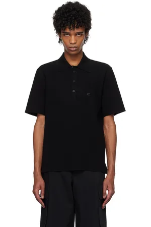 Courrèges Polo noir en tricot côtelé