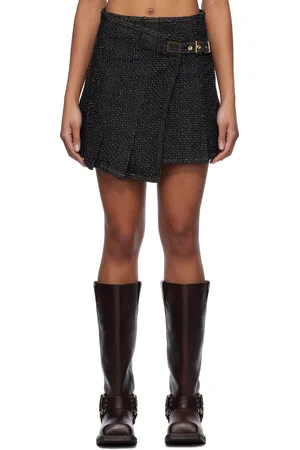 Ganni Minijupe portefeuille noire en denim texturé