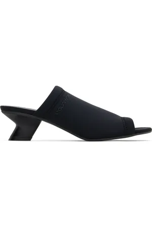 Courrèges Mules à petit talon Wet noires en tricot scuba