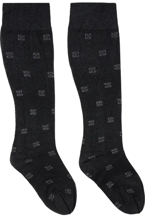 Ganni Chaussettes noires en filet à motif à logos papillon scintillant
