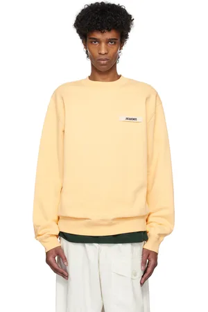 Jacquemus Pull molletonné beige à écusson en gros-grain