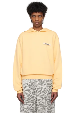 Jacquemus Pull à capuche beige à écusson en gros-grain