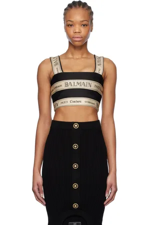 Balmain Haut écourté noir et blanc à motif à logos de style ruban