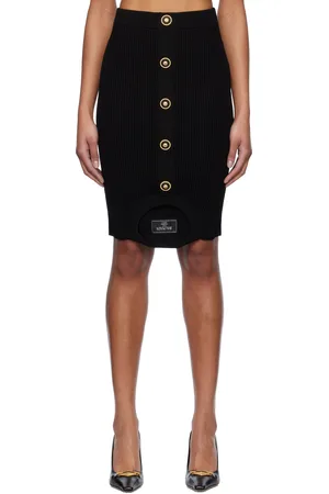 Balmain Minijupe noire en tricot côtelé à assemblage trompe l