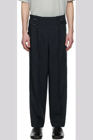 Issey Miyake Pantalon bleu marine à plis plats