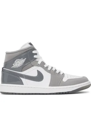 Nike Baskets mi-montantes Air Jordan 1 gris et blanc édition spéciale