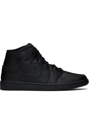 Nike Baskets mi-montantes Air Jordan 1 noires