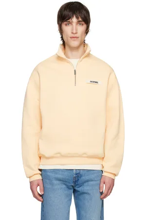 Jacquemus Pull molletonné beige à demi-glissière et à écusson en gros-grain