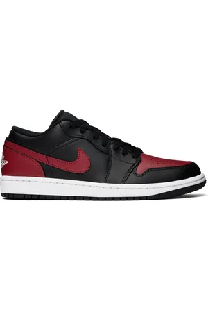 Nike Baskets basses Air Jordan 1 noir et rouge