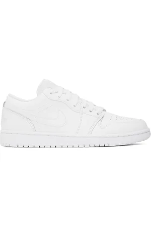 Nike Baskets basses Air Jordan 1 blanches