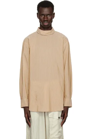DRIES VAN NOTEN Chemise beige à col roulé et à rayures