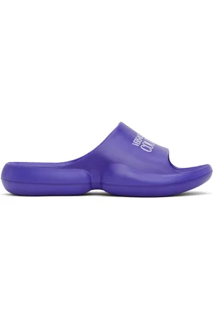 VERSACE Sandales à enfiler Tago bleues à logo
