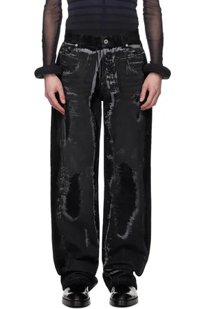 Jean Paul Gaultier Jean noir à ornements floqués