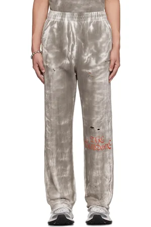 We11 Done Pantalon de survêtement gris à effet taché à la boue