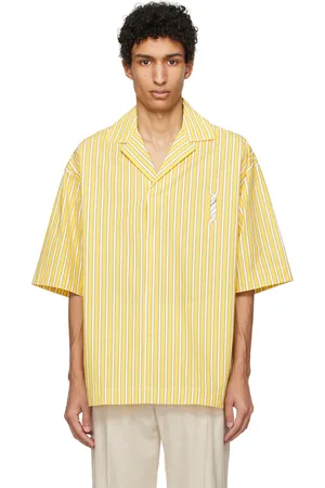 Jacquemus Polo jaune - Les sculptures