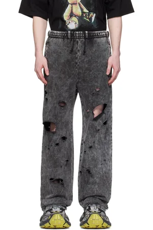 We11 Done Pantalon de survêtement noir en jersey à effet usé