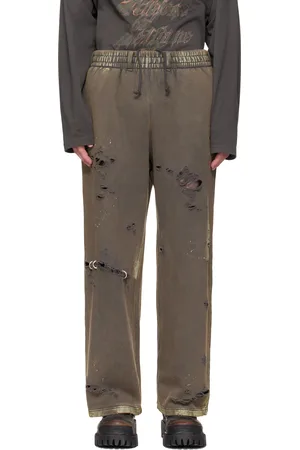 We11 Done Pantalon de survêtement gris à ferrures de style perçage